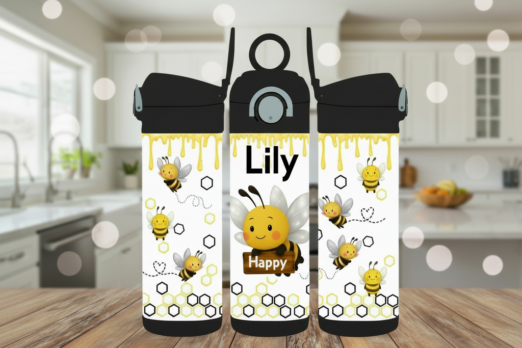 Three insulated water bottles with bee design and 'Happy' text on a kitchen counter.