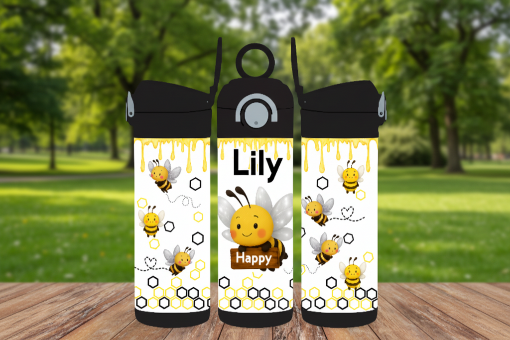 Three insulated water bottles with bee design and 'Lily' and 'Happy' text on a wooden surface.